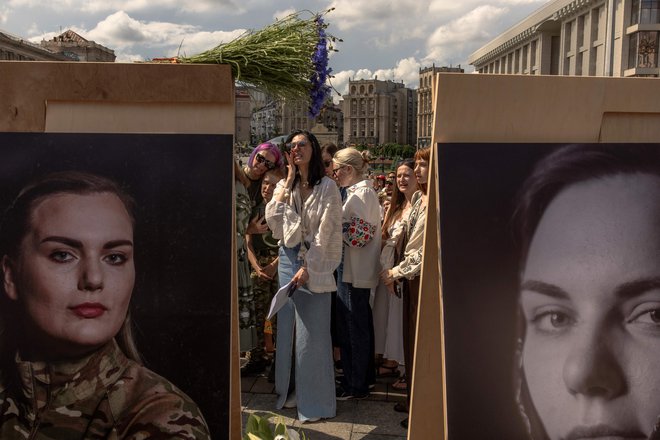 Pogrebne slovesnosti za padlimi v ukrajinski vojni v Kijevu. Foto Roman Pilipey/Afp