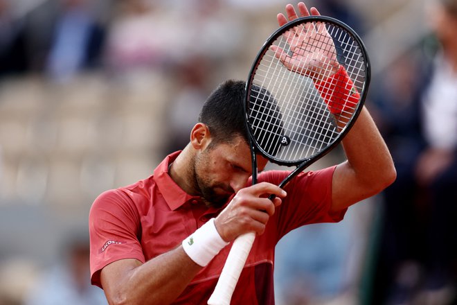 Novak Đoković bo mogoče izpustil Wimbledon in olimpijske igre v Parizu. FOTO: Stephanie Lecocq/Reuters