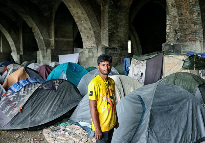 Migranti v opuščenem objektu Silos v Trstu. FOTO: Blaž Samec
