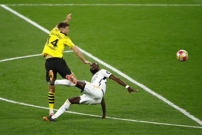 Niclas Füllkrug in Antonio Rüdiger sta bila tekmeca na Wembleyju. FOTO: Sarah Meyssonnier/Reuters