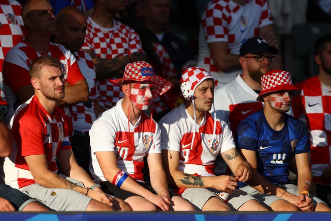 Razočarani hrvaški navijači upajo, da bo reprezentanca v nadaljevanju pokazala boljši obraz. FOTO: Lisi Niesner/Reuters