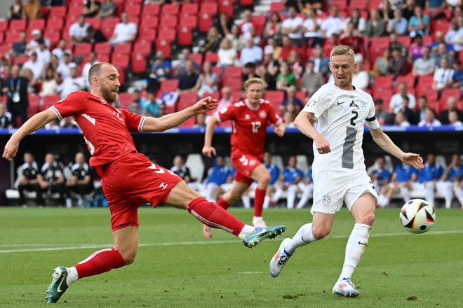 Christian Eriksen je dosegel prvi gol na tekmi. FOTO: Thomas Kienzle/AFP