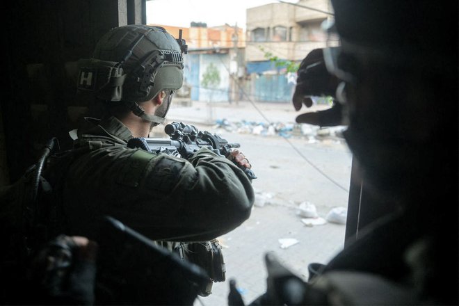 Izraelski vojaki v Gazi. FOTO: Afp