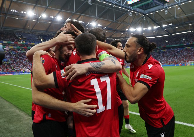 Gruzinci so se veselili senzacionalne zmage nad Portugalci. FOTO: Bernadett Szabo/Reuters