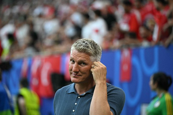 Bastian Schweinsteiger bi privoščil Slovencem napredovanje v četrtfinale evropskega prvenstva. FOTO: Gabriel Bouys/AFP