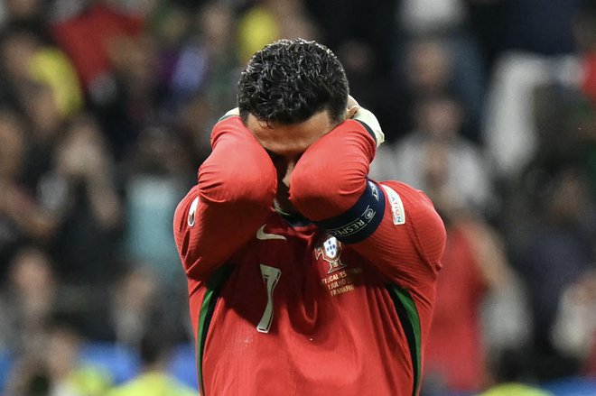 Cristiano Ronaldo ni skrival razočaranja po zapravljeni enajstmetrovki proti Sloveniji. FOTO: Patricia De Melo Moreira/AFP