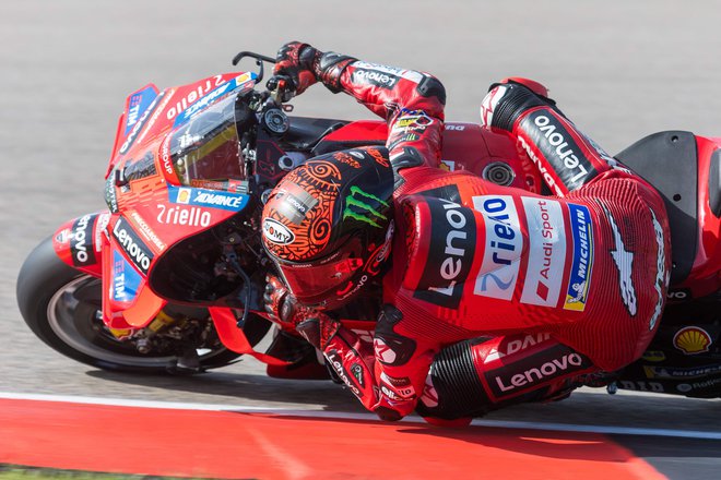 Francesco Bagnaia je prvič zmagal na Sachsenringu. FOTO: Radek Mica/AFP