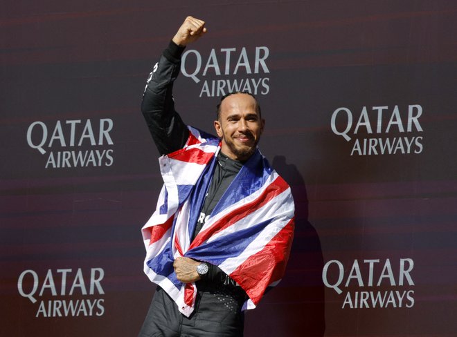 Hamilton po zmagi ni skrival čustev. FOTO: Andrew Couldridge/Reuters