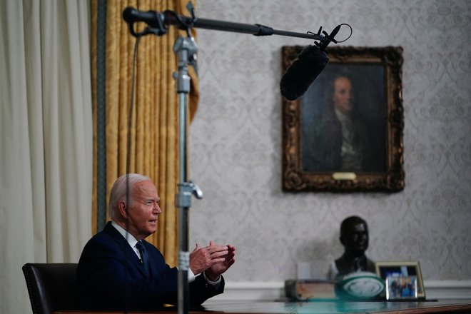Ameriški predsednik Joe Biden med nagovorom državljanom ZDA po napadu na Donalda Trumpa. FOTO: Nathan Howard/Reuters
