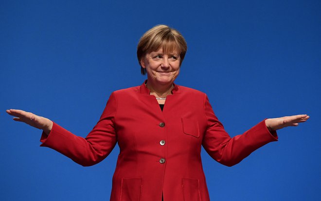 Dolgoletna nemška kanclerka Angela Merkel je ta teden praznovala svoj 70. rojstni dan FOTO: Tobias Schwarz/AFP