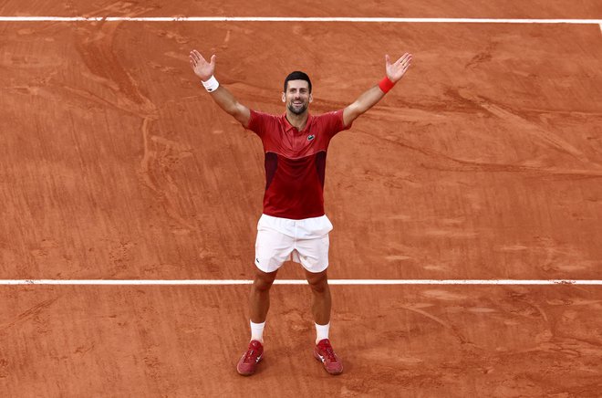 Novak Đoković je doslej na pariškem pesku osvojil tri lovorike, zdaj bo prav tu napadel naslov olimpijskega prvaka.

FOTO: Yves Herman/Reuters