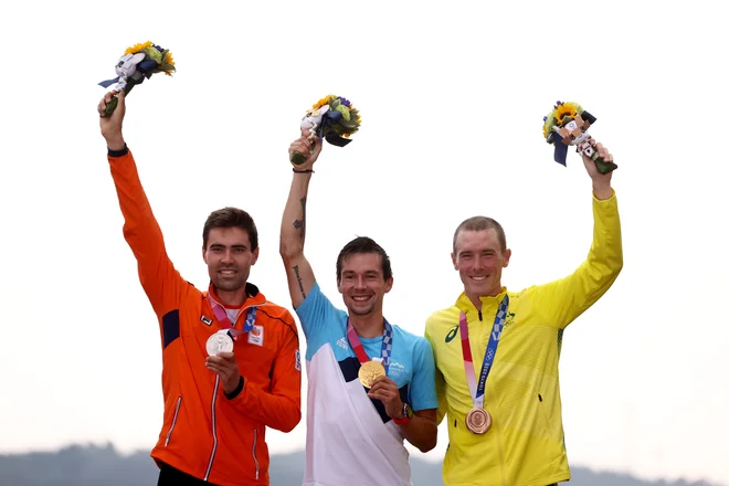 Kolesarski šampion Primož Roglič je bil na igrah v Tokiu najboljši v vožnji na čas. FOTO: Christian Hartmann/Reuters