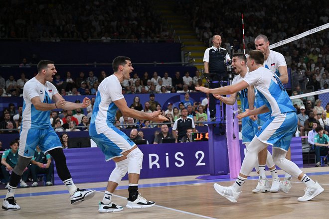 Slovenci so se razveselili prve zmage v olimpijski zgodovini. Foto Annegret Hilse/Reuters