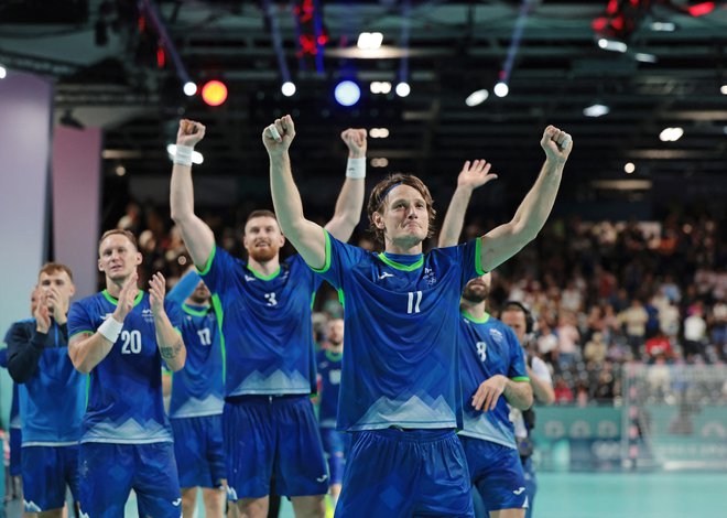Slovenci so se veselili pomembne zmage. FOTO: Paul Childs/ Reuters