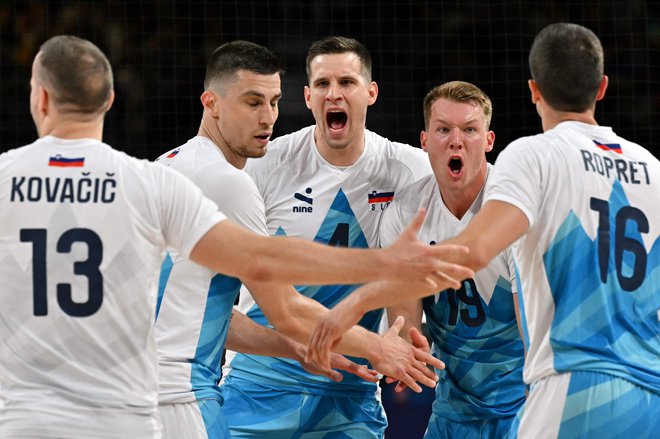 Slovenci so se veselili prve zmage proti Kanadi. FOTO: Andrej Isaković/AFP
