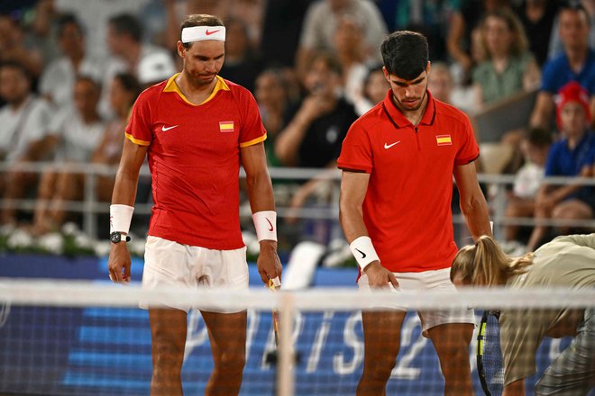 Rafael Nadal in Carlos Alcaraz sta izpadla v kategoriji dvojic. FOTO: Carl De Souza/AFP