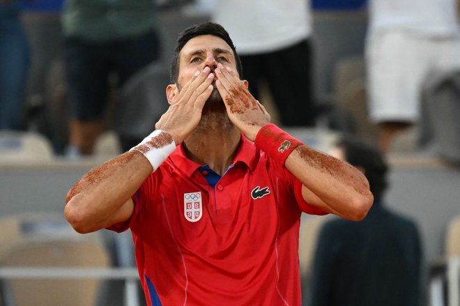 Novak Đoković se veseli finalnega dvoboja v Parizu. FOTO: Miguel Medina/AFP