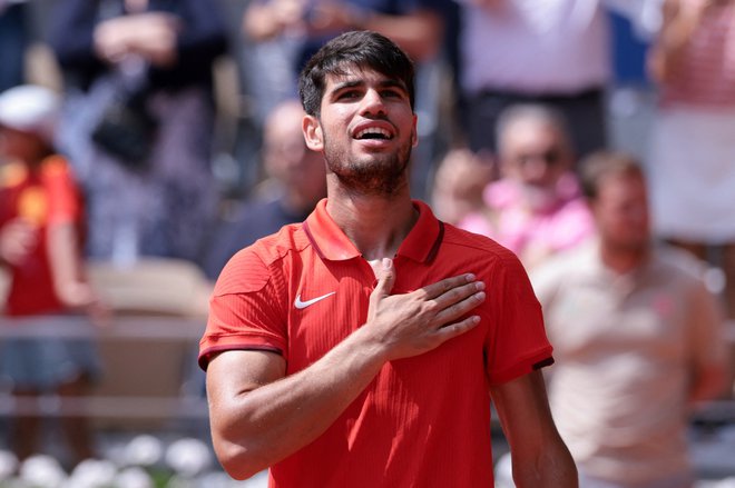 Finalni tekmec Novaka Đokovića bo Španec Carlos Alcaraz. FOTO: Claudia Greco/Reuters