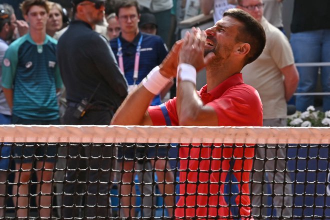 Novak Đoković ni skrival solz sreče. FOTO: Carl De Souza/AFP