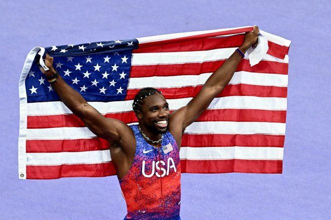 Noah Lyles je v finalu teka na 100 m osvojil zlato kolajno s časom 9,79 sekunde. FOTO: Loic Venance/AFP