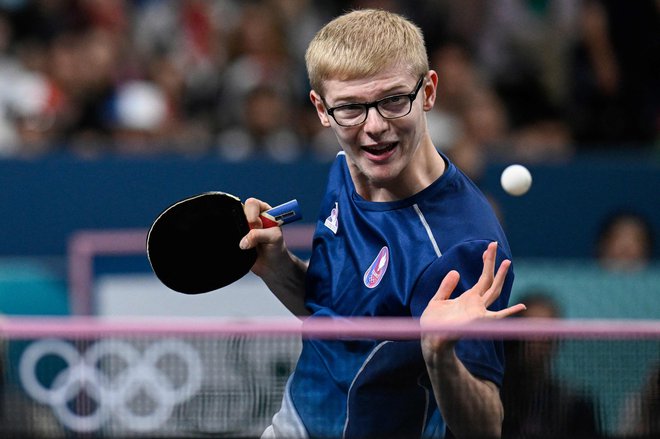 Kitajec Džengdong Fan je v finalu turnirja posameznikov v namiznem tenisu premagal Šveda Trulsa Möregaardha s 4:1 v nizih. Bron je osvojil ljubljenec občinstva Felix Lebrun (na fotografiji). Foto: Wang Zhao/Afp