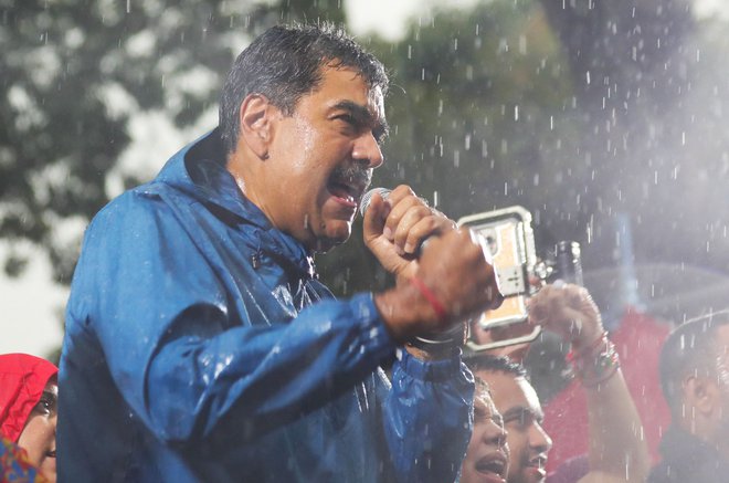 Po razglasitvi Madura za zmagovalca so v več venezuelskih mestih izbruhnili protesti. FOTO: Marcelo Garcia/AFP