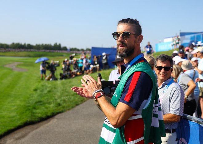Michael Phelps je na letošnjih olimpijskih igrah zgolj obiskovalec. FOTO: Matthew Childs/Reuters