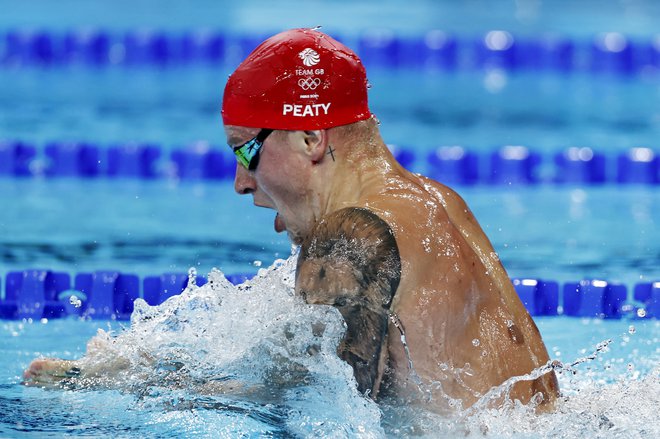 Adam Peaty je z britansko štafeto osvojil četrto mesto na 4x100 m mešano. FOTO: Clodagh Kilcoyne/Reuters