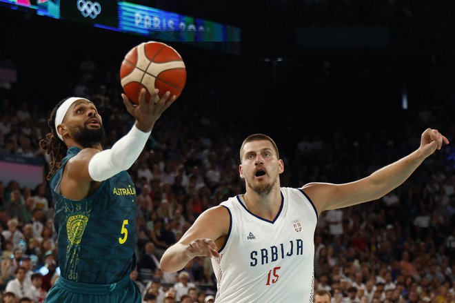 Patty Mills je dosegel 26 točk, Nikola Jokič je prispeval 21 točk in 14 skokov. FOTO: Evelyn Hockstein/Reuters