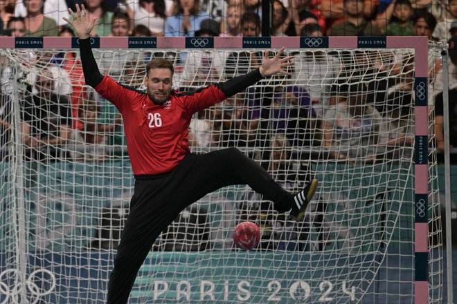 Klemen Ferlin je zelo razpoložen v vratih. FOTO: Damien Meyer/ AFP