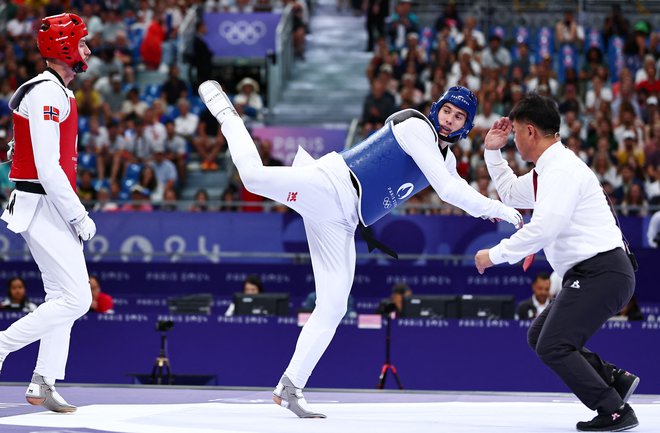 Patrik Divković (desno) je namučil favorita. FOTO: Tingshu Wang/ Reuters