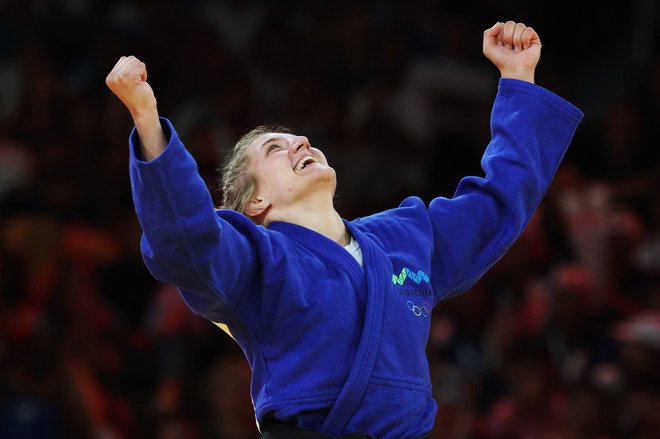 Andreja Leški si je kot tretja slovenska judoistka po Urški Žolnir Jugovar in Tini Trstenjak izbojevala naslov olimpijske prvakinje. FOTO: Kim Kyung-hoon/Reuters