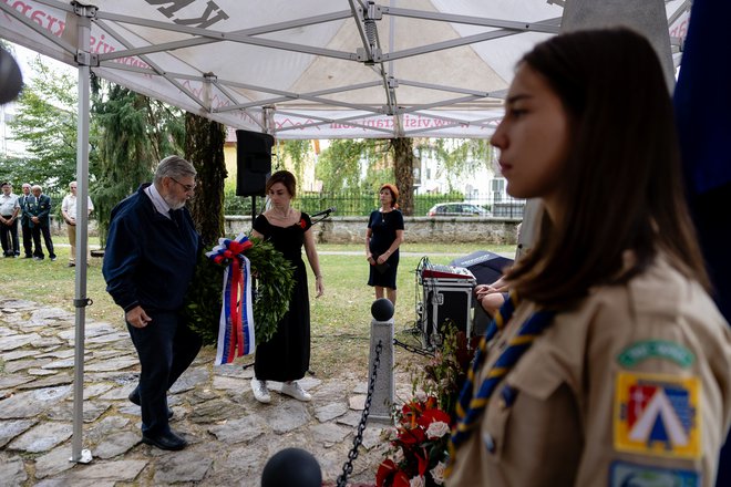 Milan Pahor, predsednik odbora Bazoviški junaki, se je včeraj udeležil tudi slovesnosti pred obnovljenim spomenikom v Kranju. FOTO: Črt Piksi/Delo