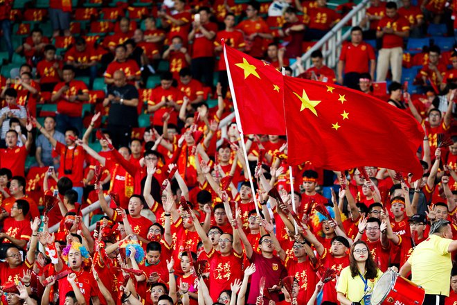 Kitajska nogometna reprezentanca se meri v tretjem krogu azijskih kvalifikacij za svetovno prvenstvo 2026. FOTO: China Stringer Network/Reuters