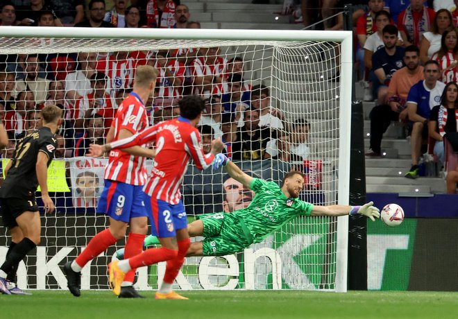 Jan Oblak je vnovič brezhibno opravil svojo nalogo. FOTO: Pierre-Philippe Marcou/AFP