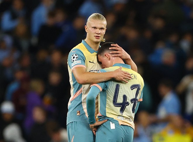 Kljub remiju Haaland in Phil Foden nista bila preveč razočarana, točka proti Interju ni neuspeh. FOTO: Molly Darlington/Reuters