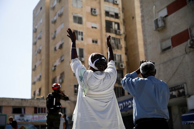 Neskončna tragedija prebivalcev Gaze je zaradi izraelskega napada na Libanon in predvsem grožnje velike vojne z Iranom dobesedno čez noč postala včerajšnja novica. FOTO: Shir Torem/Reuters