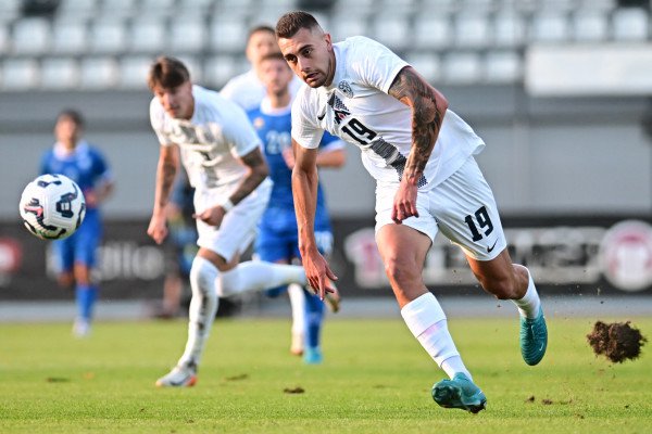 Nejc Gradišar je s svojim prvim golom v kvalifikacijah priboril Sloveniji dragoceno točko. FOTO: Martin Metelko/NZS