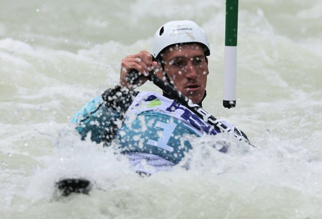 Luka Božič je najhitreje preveslal kratki slalom na Kitajskem. FOTO: Blaž Samec/Delo