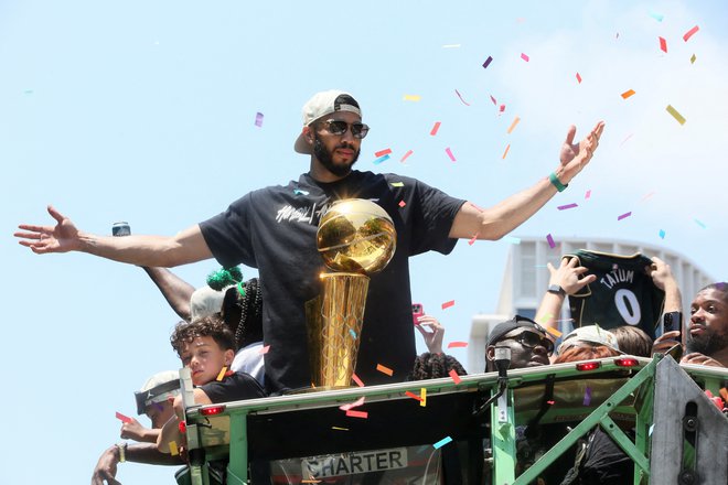 Jayson Tatum se je veselil naslova Bostona. FOTO: Lauren Owens/Reuters