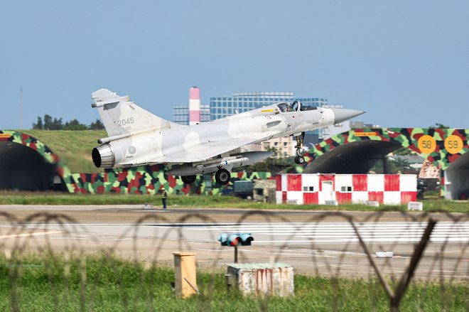 Tajvan je nove vaje označil kot provokacijo in neracionalno dejanje. FOTO: I-hwa Cheng/AFP