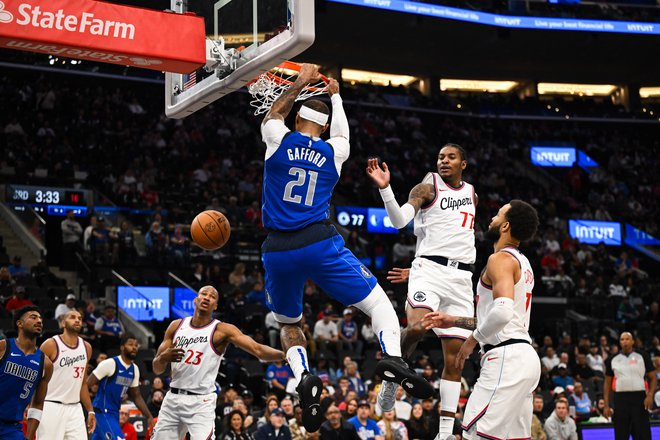 Košarkarji moštva Dallas Mavericks (ma fotografiji Daniel Gafford med zabijanjem) so morali priznati premoč igracem kluba LA Clippers. FOTO: Jonathan Hui/Usa Today Sports