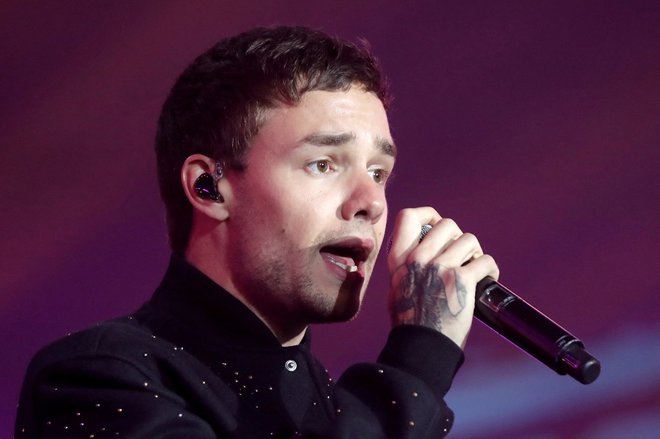 Liam Payne med nastopom na otvoritveni slovesnosti letošnjih OI v Parizu. FOTO: Charles Platiau/Reuters