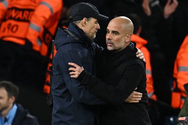 Pep Guardiola (desno) je kolegu in nekdanjemu tekmecu Thomasu Tuchlu čestital za izbor selektorja Anglije in mu zaželel vse najboljše. FOTO: Paul Ellis/AFP