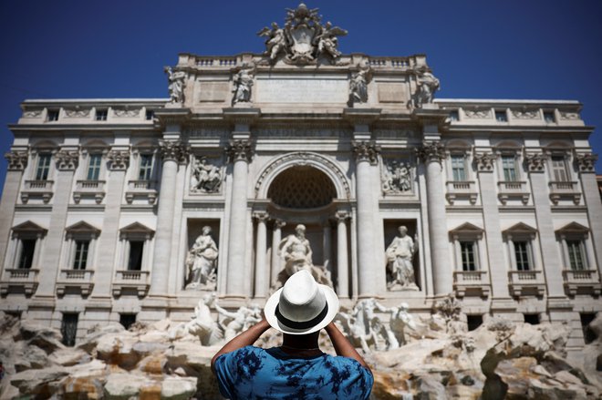 Največ turistov je obiskalo Italijo. FOTO: Guglielmo Mangiapane/Reuters