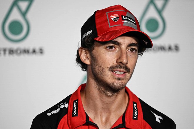 Francesco Bagnaia se strinja s prestavitvijo dirke. FOTO: Lillian Suwanrumpha/AFP