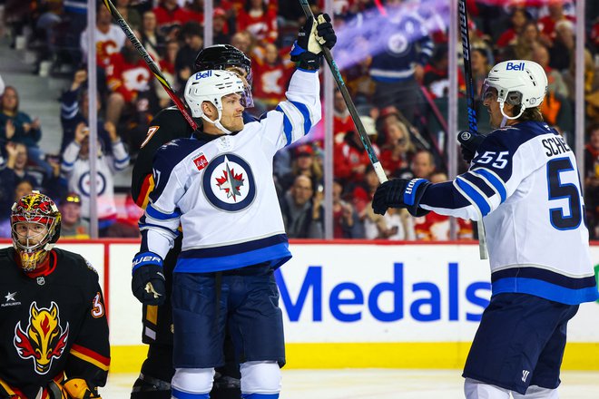 Nikolaj Ehlers je dosegel hat-trick. FOTO: Sergei Belski/USA Today Sports