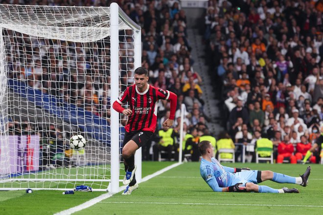 Alvaro Morata je bil med osrednjimi junaki Milanove zmage v Madridu.FOTO: Pierre-Philippe Marcou/AFP