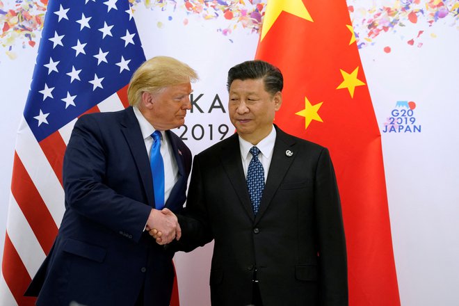 Med prvim Trumpovim mandatom sta se ameriški predsednik in Xi Jinping štirikrat sestala. FOTO: Kevin Lamarque/Reuters