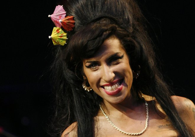 Črna ideja o Klubu 27 je ponovno oživela s smrtjo Amy Winehouse leta 2011. FOTO: Luke Macgregor/Reuters